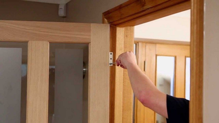 fix squeaky door hinge